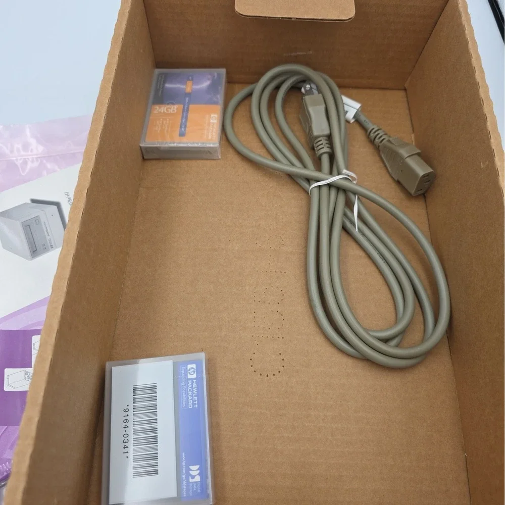 HP Surestore DAT24 External Tape Drive With Accessories Open Box New